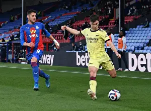 Arsenal's Kieran Tierney Faces Pressure from Crystal Palace's Joel Ward During Premier League Clash