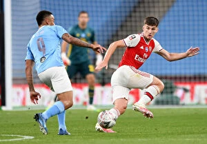 Arsenal v Manchester City - FA Cup Semi-Final 2019-20 Collection: Arsenal's Kieran Tierney Goes Head-to-Head with Manchester City in FA Cup Semi-Final Clash