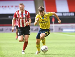 Arsenal's Kieran Tierney Goes Head-to-Head with John Lundstram in FA Cup Quarterfinal Showdown