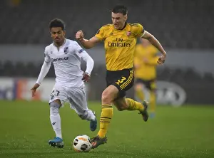 Arsenal's Kieran Tierney Goes Head-to-Head with Marcus Edwards in Europa League Showdown