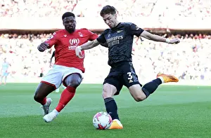Nottingham Forest V Arsenal 2022-23 Prints: Arsenal's Kieran Tierney Goes Head-to-Head with Nottingham Forest: Premier League Showdown