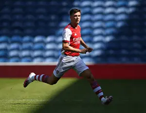 Glasgow Rangers V Arsenal 2021-22 Prints: Arsenal's Kieran Tierney Goes Head-to-Head with Rangers at Ibrox Stadium