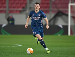 Olympiacos V Arsenal 2020-21 Prints: Arsenal's Kieran Tierney in Empty Karaiskakis Stadium: Arsenal vs