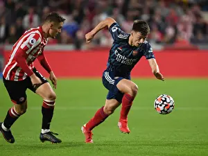 Arsenal's Kieran Tierney Outsmarts Sergi Canos: A Premier League Battle at Brentford