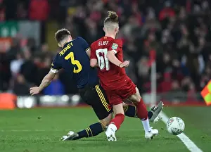 Arsenal's Kieran Tierney Tackles Liverpool's Harvey Elliott in Carabao Cup Clash