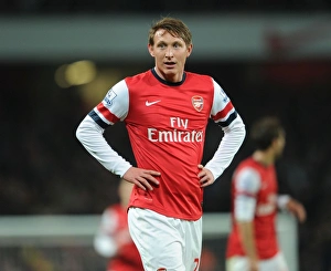 Arsenal's Kim Kallstrom in Action against Swansea City (2014)