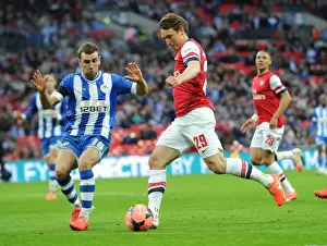 Arsenal V Wigan Athletic - FA Cup Semi Final 2014 Prints: Arsenal's Kim Kallstrom Faces Off Against Wigan's James McArthur in FA Cup Semi-Final Showdown