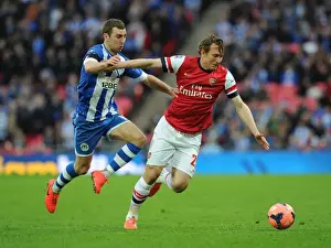 Arsenal V Wigan Athletic - FA Cup Semi Final 2014 Prints: Arsenal's Kim Kallstrom Outmaneuvers James McArthur in FA Cup Semi-Final Showdown