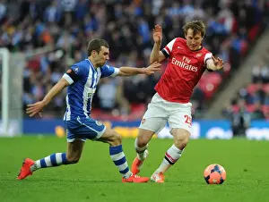 Arsenal's Kim Kallstrom Outmaneuvers Wigan's James McArthur in FA Cup Semi-Final Showdown