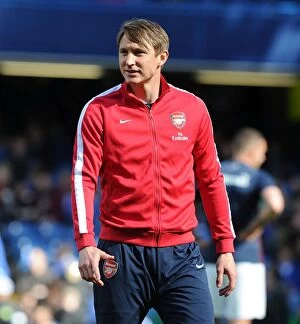 Images Dated 22nd March 2014: Arsenal's Kim Kallstrom Warming Up Ahead of Chelsea Clash - Premier League 2013-14