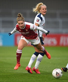 Arsenal Women v Tottenham Hotspur Women - FA Cup 2020-21 Collection: Arsenal's Kim Little Dazzles with Agile Footwork Against Tottenham's Chloe Peplow in FA Cup Clash