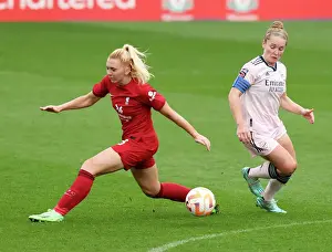 Liverpool Women V Arsenal Women 2022-23 Prints: Arsenal's Kim Little Outsmarts Liverpool's Ceri Holland: A Pivotal Moment in the FA WSL Clash