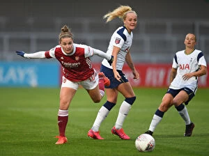 Arsenal Women v Tottenham Hotspur Women - FA Cup 2020-21 Collection: Arsenal's Kim Little Outsmarts Tottenham's Chloe Peplow in Thrilling FA Cup Clash