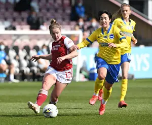 Arsenal Women V Brighton And Hove Albion 2020-21 Prints: Arsenal's Kim Little vs. Brighton's Lee Geum-min: A Showdown in Empty FA WSL Match