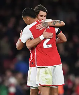 Arsenal's Kiwior and Saliba Celebrate Victory Over Burnley in 2023-24 Premier League
