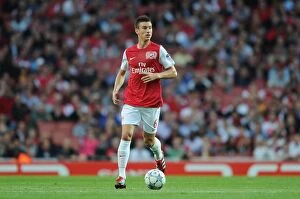 Arsenal v Udinese 2011-12 Collection: Arsenal's Koscielny in Action: Arsenal vs. Udinese, 2011-12 UEFA Champions League