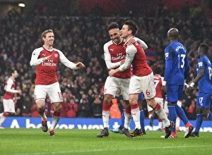 Images Dated 3rd February 2018: Arsenal's Koscielny, Aubameyang, and Monreal Celebrate Goal Against Everton (2017-18)