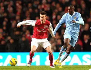 Arsenal's Koscielny Battles Past Yaya Toure in Manchester City Showdown (2011-12 Premier League)