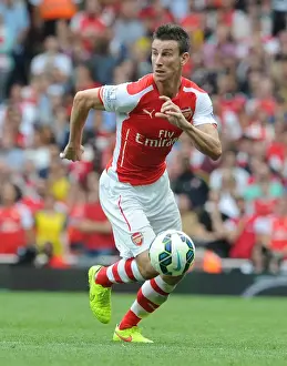 Arsenal V Manchester City 2014-15 Prints: Arsenal's Koscielny Faces Manchester City in the Premier League