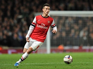 Arsenal V Chelsea - Capital One Cup 4th Rd 2013-14 Prints: Arsenal's Koscielny Faces Off Against Chelsea in Capital One Cup Showdown