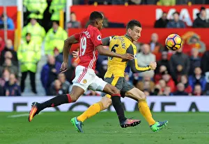 Arsenal's Koscielny Faces Pressure from Rashford in Manchester United Clash (Premier League 2016-17)