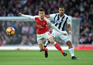 Images Dated 26th December 2016: Arsenal's Koscielny Fends Off Rondon: Arsenal v West Bromwich Albion, Premier League (2016-17)