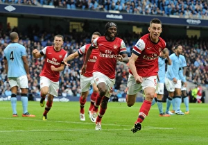 Manchester City V Arsenal 2012:13 Prints: Arsenal's Koscielny, Giroud