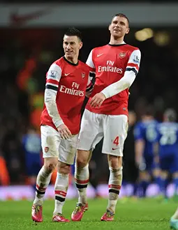 Arsenal V Cardiff City 2013-14 Prints: Arsenal's Koscielny and Mertesacker Celebrate Victory Over Cardiff City