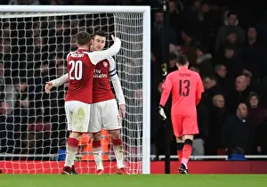 Arsenal V Chelsea - Carabao Cup 2017-18 Prints: Arsenal's Koscielny and Mustafi: A Moment of Reflection after the Carabao Cup Semi-Final against Chelsea