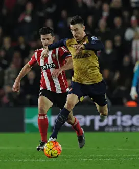 Southampton V Arsenal 2015-16 Prints: Arsenal's Koscielny Outsmarts Southampton's Long: A Premier League Battle (December 2015)