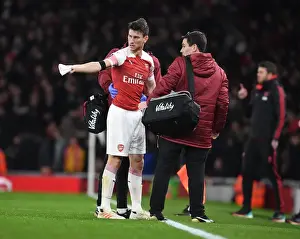 Arsenal V Manchester United FA Cup 2018-19 Prints: Arsenal's Koscielny Receives Medical Treatment from Doctor O'Driscoll during Arsenal vs Manchester United FA