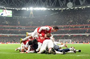 Arsenal's Koscielny and Teammates Celebrate 2:1 Victory Over Everton