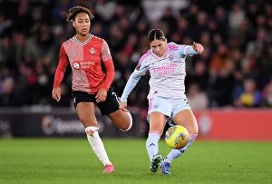Southampton Women V Arsenal Women - Conti Cup 2023-24 Prints: Arsenal's Kyra Cooney-Cross Faces Off Against Southampton's Lexi Lloyd-Smith in FA Women's Continental