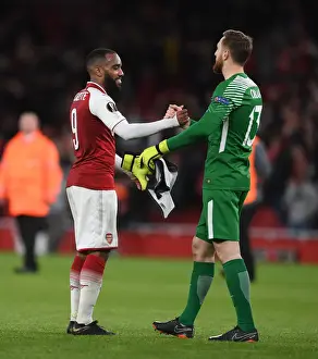 Arsenal V Atletico Madrid 2017-18 Prints: Arsenal's Lacazette and Atletico's Oblak Exchange Handshakes in Europa League Semi-Final