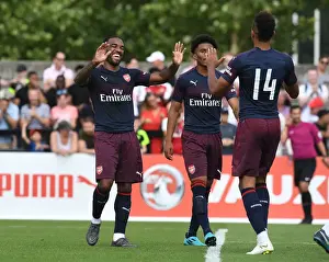 Arsenal's Lacazette and Aubameyang Celebrate Goal in Borehamwood Friendly