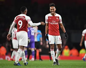 Arsenal V Newcastle United 2018-19 Prints: Arsenal's Lacazette and Aubameyang: Celebrating Glory over Newcastle United in the Premier League