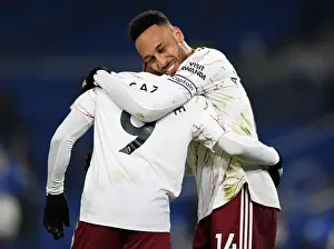 Arsenal's Lacazette and Aubameyang: A Deadly Duo Celebrates Goal Scoring Success Against Brighton & Hove Albion