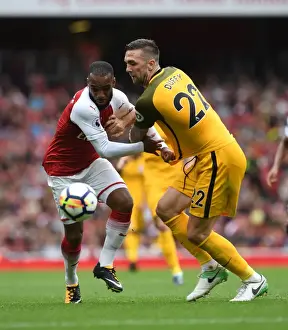 Arsenal V Brighton And Hove Albion 2017-18 Prints: Arsenal's Lacazette Clashes with Brighton's Duffy in Premier League Showdown