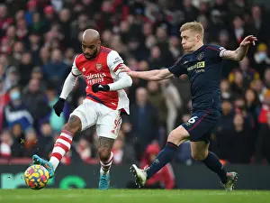 Arsenal's Lacazette Clashes with Burnley's Tarkowski in Intense Premier League Battle