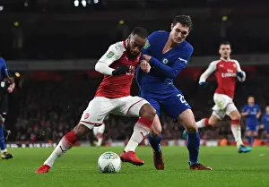Arsenal V Chelsea - Carabao Cup 2017-18 Prints: Arsenal's Lacazette Clashes with Chelsea's Christensen in Carabao Cup Semi-Final Showdown