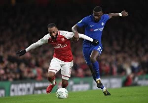 Images Dated 24th January 2018: Arsenal's Lacazette Clashes with Chelsea's Rudiger in Carabao Cup Semi-Final Showdown