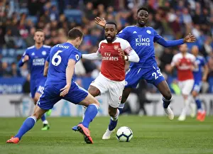 Leicester City V Arsenal 2018-19 Prints: Arsenal's Lacazette Clashes with Leicester's Evans and Ndidi in Premier League Showdown
