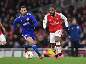 Arsenal's Lacazette Clashes with Olympiacos Guilherme in Europa League Showdown