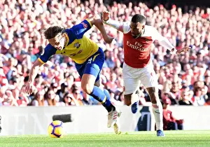 Arsenal's Lacazette Clashes with Southampton's Vestergaard in Premier League Showdown