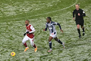 Arsenal's Lacazette Clashes with West Brom's Sawyers in Premier League Showdown