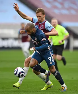 Arsenal's Lacazette Clashes with West Ham's Soucek in Premier League Showdown