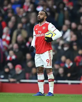 Arsenal V Chelsea 2019-20 Prints: Arsenal's Lacazette Faces Off Against Chelsea in Intense Premier League Showdown