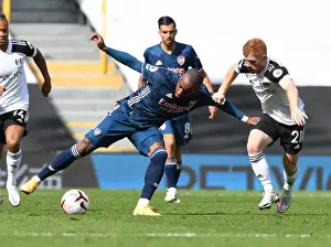 Arsenal's Lacazette Faces Off Against Fulham's Reed in Premier League Clash