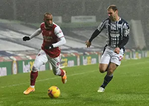 Arsenal's Lacazette Faces Off Against Ivanovic in West Bromwich Albion vs Arsenal Clash (2020-21)