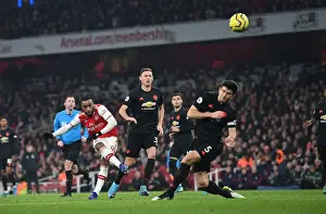 Arsenal's Lacazette Faces Off Against Matic in Intense Arsenal v Manchester United Clash (2019-20)